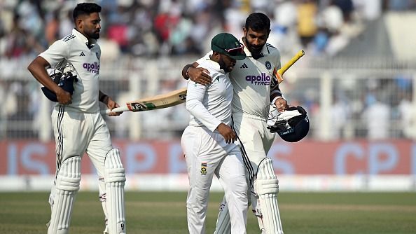 India's Jasprit Bumrah (R) talks with South Africa's Temba Bavuma (C) in this frame India's Jasprit Bumrah (R) talks with South Africa's Temba Bavuma (C) in this frame