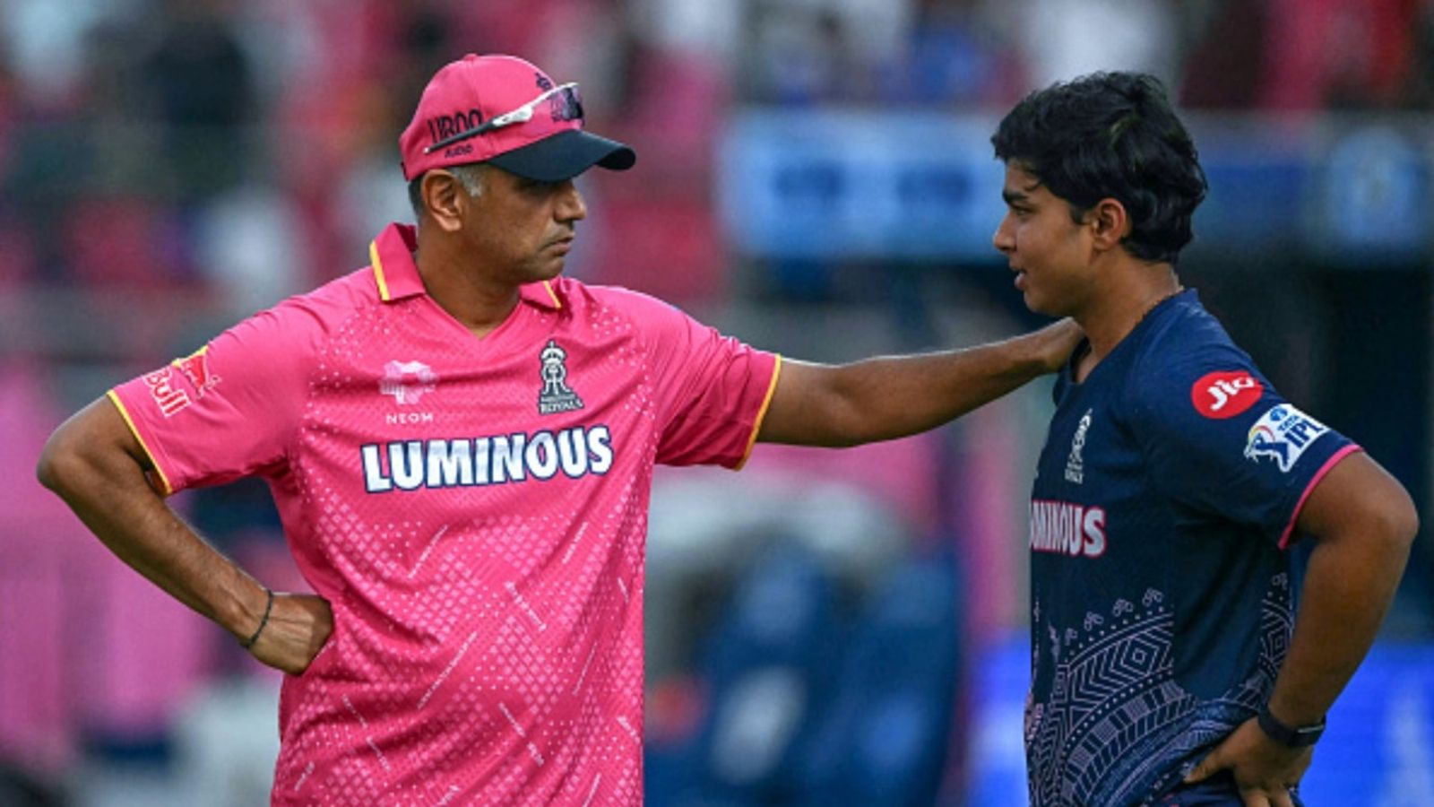 Rajasthan Royals announce Rahul Dravid's replacement as head coach for IPL 2026: Full details of coaching staff Rajasthan Royals' Vaibhav Suryavanshi (R) speaks with team's head coach Rahul Dravid before the start of the Indian Premier League (IPL) match against Mumbai Indians at the Sawai Mansingh Stadium in Jaipur on May 1, 2025.