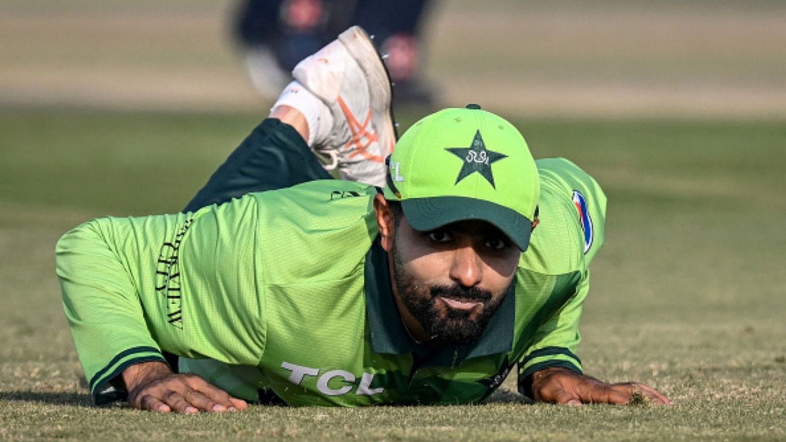 Babar Azam penalised by ICC for this act during 3rd ODI against Sri Lanka Pakistan's Babar Azam reacts as he dives to field the ball during the third ODI against Sri Lanka at the Rawalpindi Cricket Stadium in Rawalpindi on November 16, 2025.