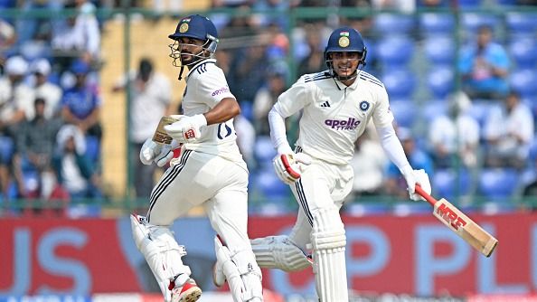 India's captain Shubman Gill (R) and his teammate Nitish Kumar Reddy run between the wickets