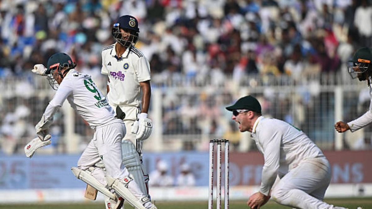 Simon Harmer (R) of South Africa successfully takes the catch of Washington Sundar (2L) of India during the First Test match in the series between India and South Africa at Eden Gardens Simon Harmer (R) of South Africa successfully takes the catch of Washington Sundar (2L) of India during the First Test match in the series between India and South Africa at Eden Gardens