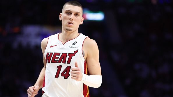 Tyler Herro #14 of the Miami Heat looks on against the Cleveland Cavaliers during the third quarter in Game Four of the Eastern Conference First Round NBA Playoffs at Kaseya Center on April 28, 2025 in Miami, Florida.