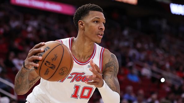 Jabari Smith Jr. #10 of the Houston Rockets handles the ball against the Washington Wizards during the second half at Toyota Center on November 12, 2025 in Houston, Texas.