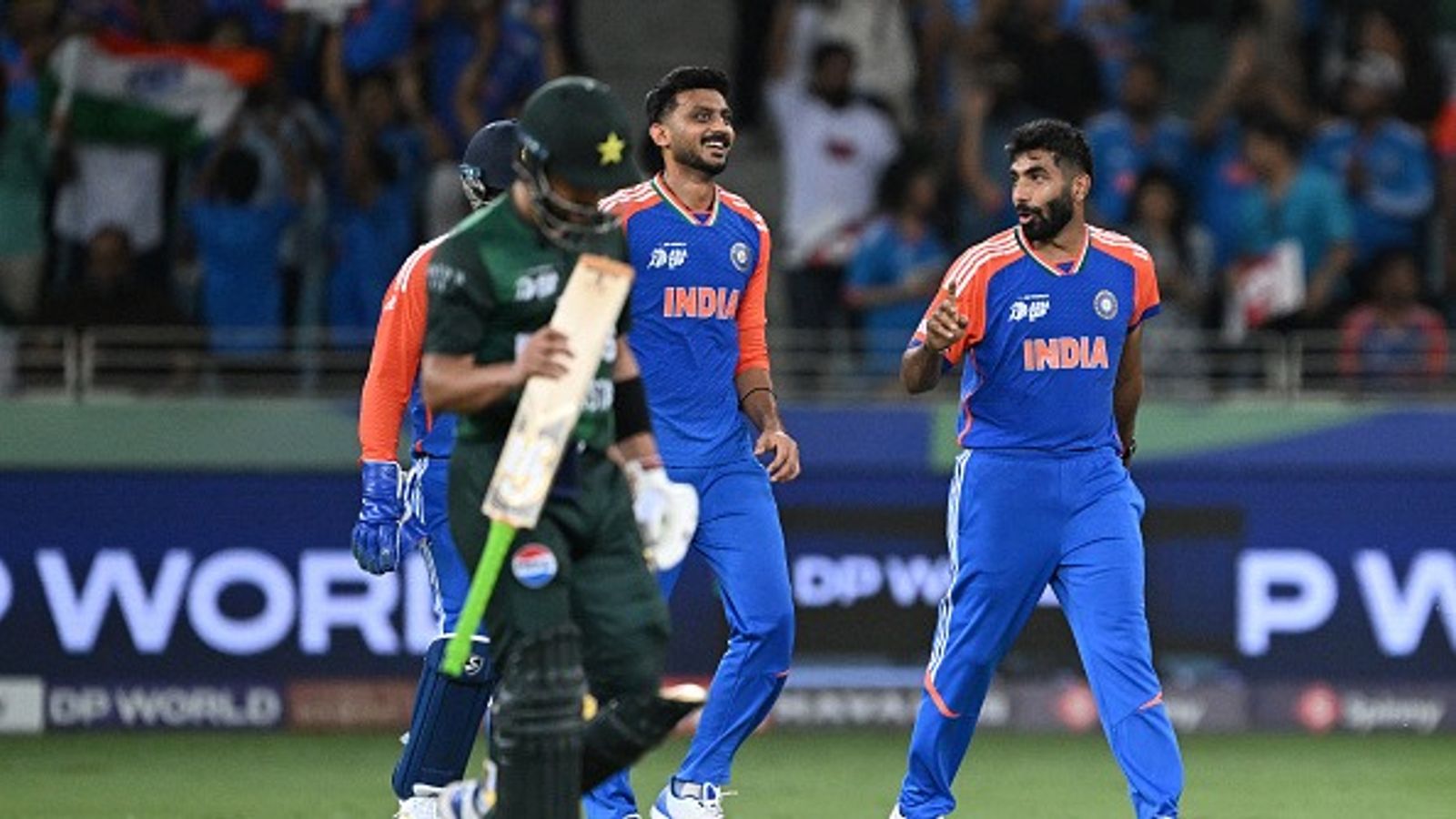 India and Pakistan to be placed in same group for T20 World Cup 2026 despite Asia Cup 2025 controversies Axar Patel (C) celebrates with Jasprit Bumrah (R) after taking the wicket of Pakistan's captain Salman Agha during the Asia Cup 2025 Twenty20 international cricket match between India and Pakistan