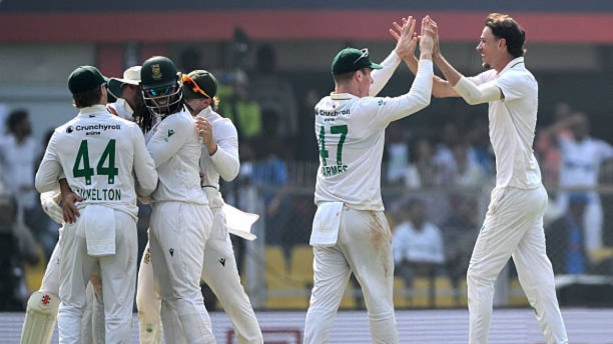 South Africa's Marco Jansen (R) celebrates with teammates after taking the wicket of India's Nitish Kumar Reddy during the third day of the second Test cricket match between India and South Africa