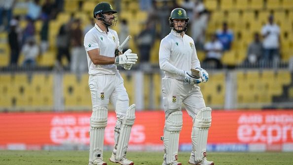 South Africa's Aiden Markram (L) and Ryan Rickelton walk back to the pavilion at the end of the third day of the second Test cricket match between India and South Africa at the Barsapara Cricket Stadium