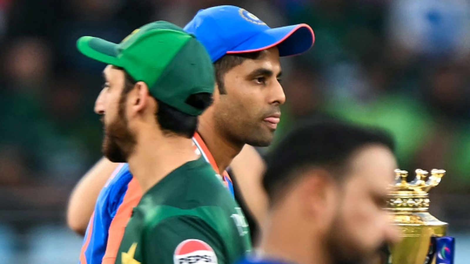India-Pakistan T20 World Cup 2026 clash date revealed, Colombo finalised as arch-rivals' battle arena India's captain Suryakumar Yadav (C-back) walks past his Pakistani counterpart Salman Agha after the toss before the start of the Asia Cup 2025 T20 final at the Dubai International Stadium in Dubai on September 28, 2025.