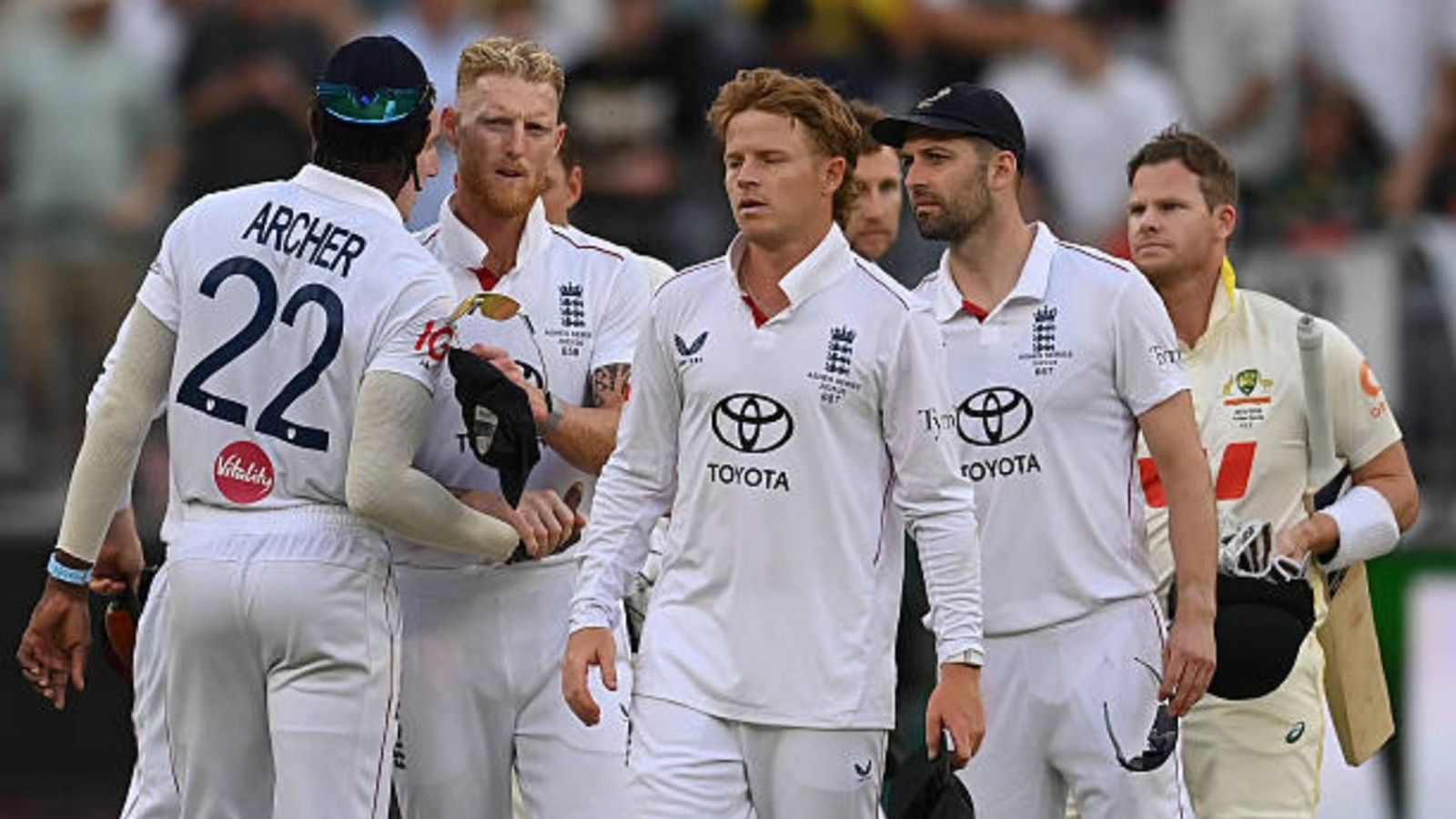 'We could have performed better...': Ben Stokes reflects on England's defeat in 1st Ashes Test, hopes to do better in Brisbane Ben Stokes, Ollie Pope and Mark Wood of England react after Australia won the First 2025/26 Ashes Series Test Match between Australia and England at Perth Stadium