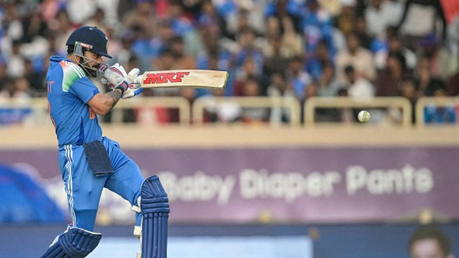 Punjab Kings' emotional social media post featuring MS Dhoni in Ranchi during Virat Kohli's century celebration goes viral India's Virat Kohli plays a shot during the first one-day international (ODI) cricket match between India and South Africa at the JSCA International Stadium