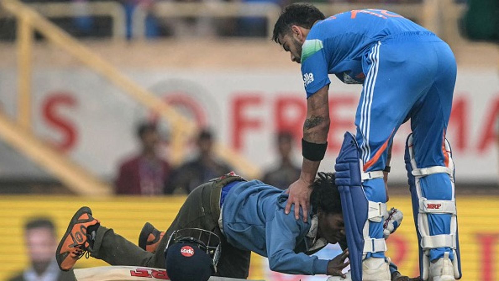 'I'm still looking to get better every day of my life': Virat Kohli reveals he is aware of his 'own feelings' in failure and success A pitch invader and fan of India's Virat Kohli (R) touches his feet during the first ODI of the series against South Africa at the JSCA International Stadium in Ranchi on November 30, 2025.
