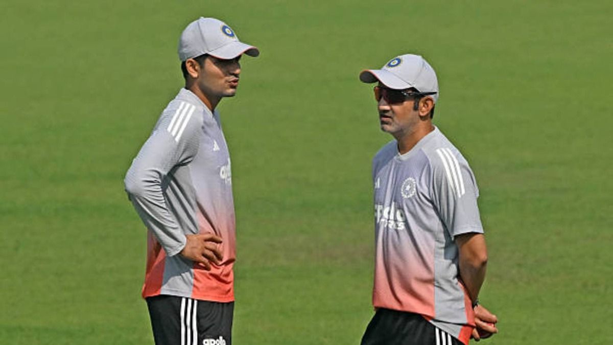India's captain Shubman Gill (L) and head coach Gautam Gambhir interact during a practice session on the eve of their first Test cricket match against South Africa, at the Eden Gardens in Kolkata