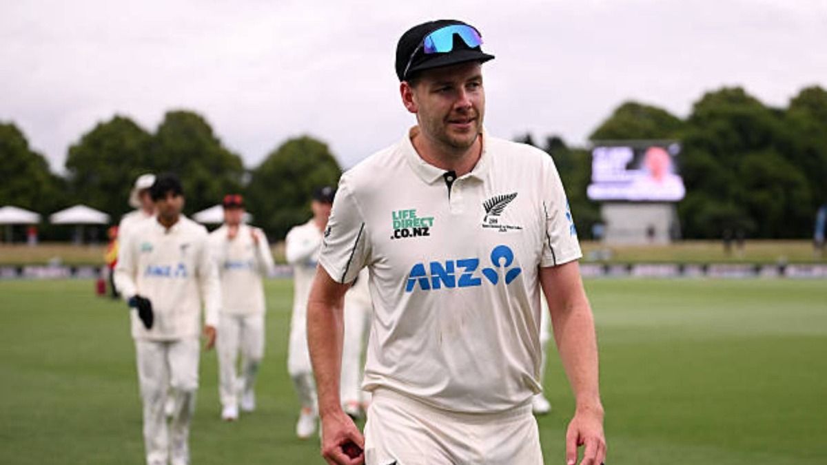 Jacob Duffy of New Zealand leads his team from the field after taking a five wicket bag during day two of the First Test match in the series between New Zealand and West Indies at Hagley Oval