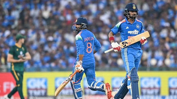 India's Ravindra Jadeja (C) and stand-in captain KL Rahul in this frame