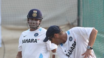 Sachin Tendulkar with coach with Gary Kirsten during a practice session ahead of the first Test match between India and New Zealand Sachin Tendulkar with coach with Gary Kirsten during a practice session ahead of the first Test match between India and New Zealand
