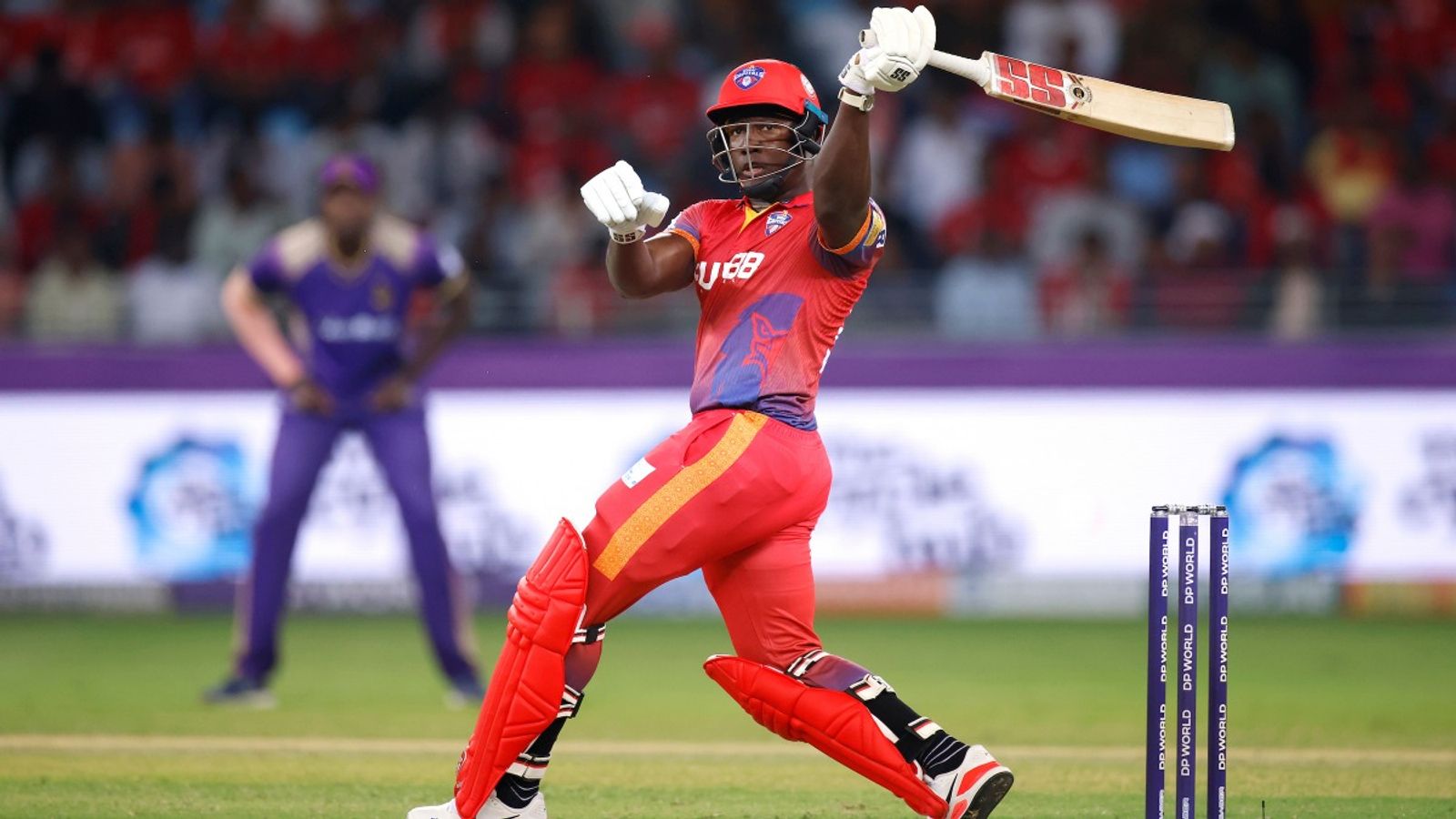 Retained by KKR despite just one inning in IPL 2025, West Indies batter smashes 52-ball 96 for Capitals, hands Knight Riders 83-run defeat Rovman Powell of Dubai Capitals plays a shot during ILT20 2025 match against Abu Dhabi Knight Riders on December 7.