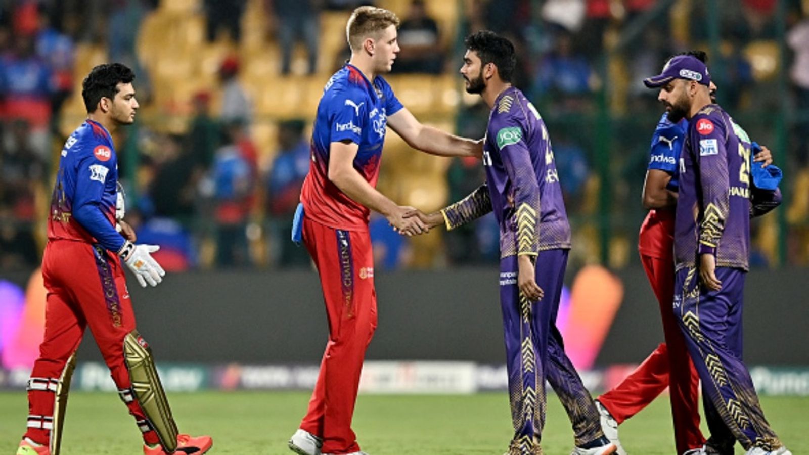 Cameron Green breaks Mitchell Starc's record for most expensive player in IPL mini-auction history Kolkata Knight Riders' Venkatesh Iyer (C) is congratulated by Royal Challengers Bengaluru's Cameron Green (2L) after their win in IPL 2024.
