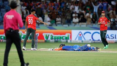 Availability doubt looms over KKR’s Rs 9.2 crore recruit ahead of IPL 2026 Bangladesh's Mustafizur Rahman (L) watches on as India's Abhishek Sharma is lying on the ground in this frame. (Getty)