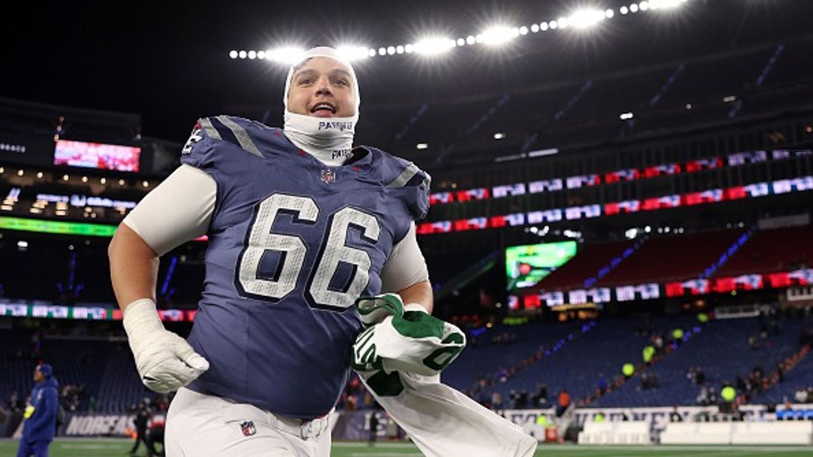 WATCH: Patriots rookie Will Campbell goes viral after shirtless beer chug at Celtics vs Heat game Will Campbell in the frame.