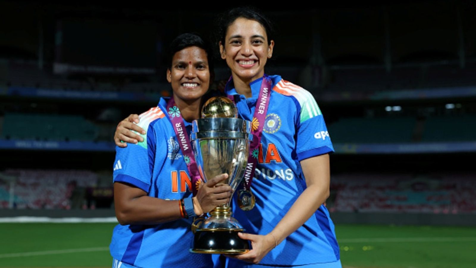 India's World Cup 2025 Player of the series becomes no.1 ranked T20I bowler, Mandhana loses no.1 ODI batter spot to South Africa captain Deepti Sharma and Smriti Mandhana of India pose with the ICC Women's Cricket World Cup trophy after the ICC Women's Cricket World Cup India 2025 Final against South Africa at Dr. DY Patil Sports Academy on November 02, 2025 in Navi Mumbai.