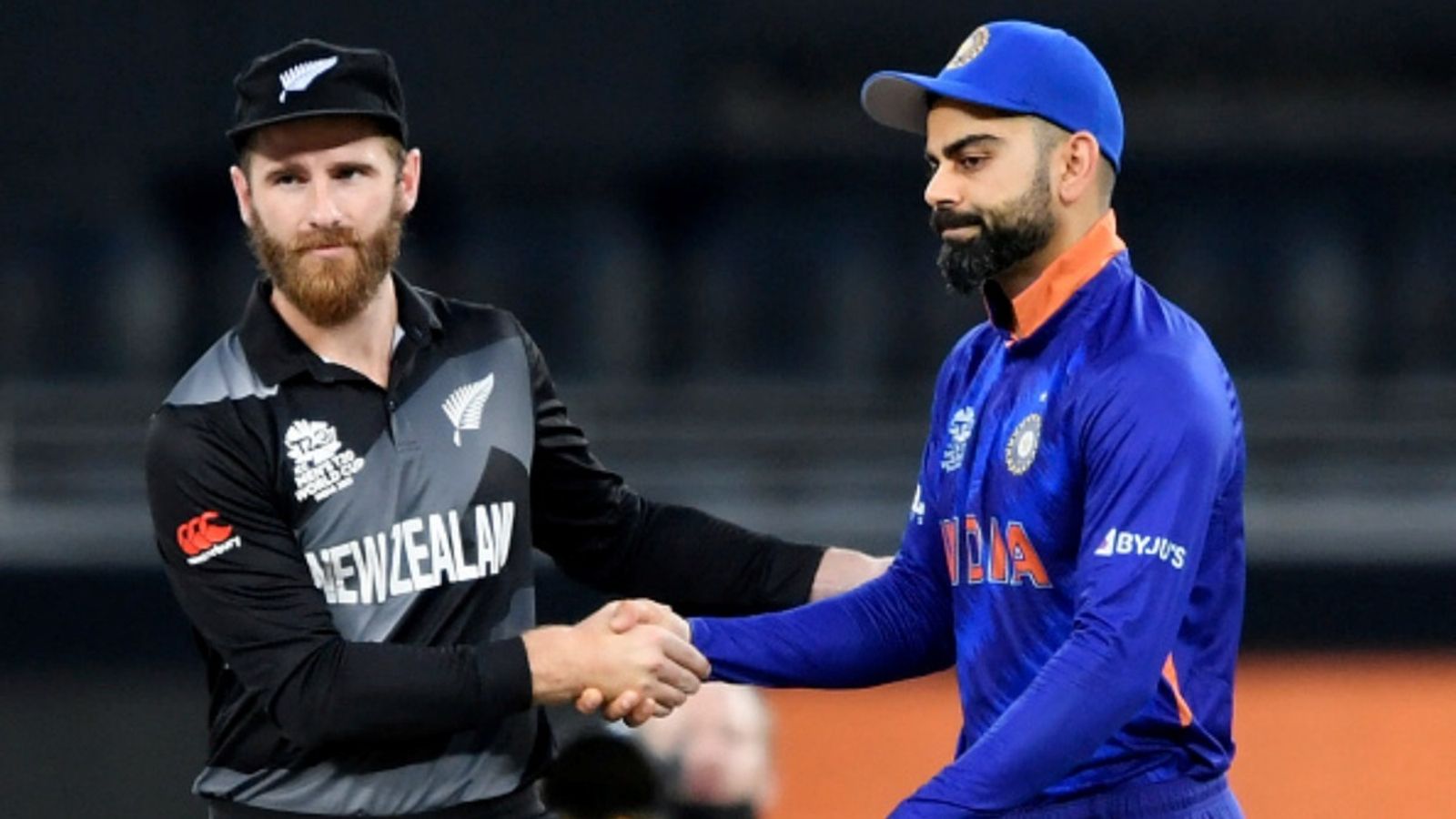 Explained: Why Kane Williamson isn't part of New Zealand's squad for ODI series vs India New Zealand's Kane Williamson (L) shakes hands with his Indian counterpart Virat Kohli before the start of the ICC T20 World Cup 2021 clash.