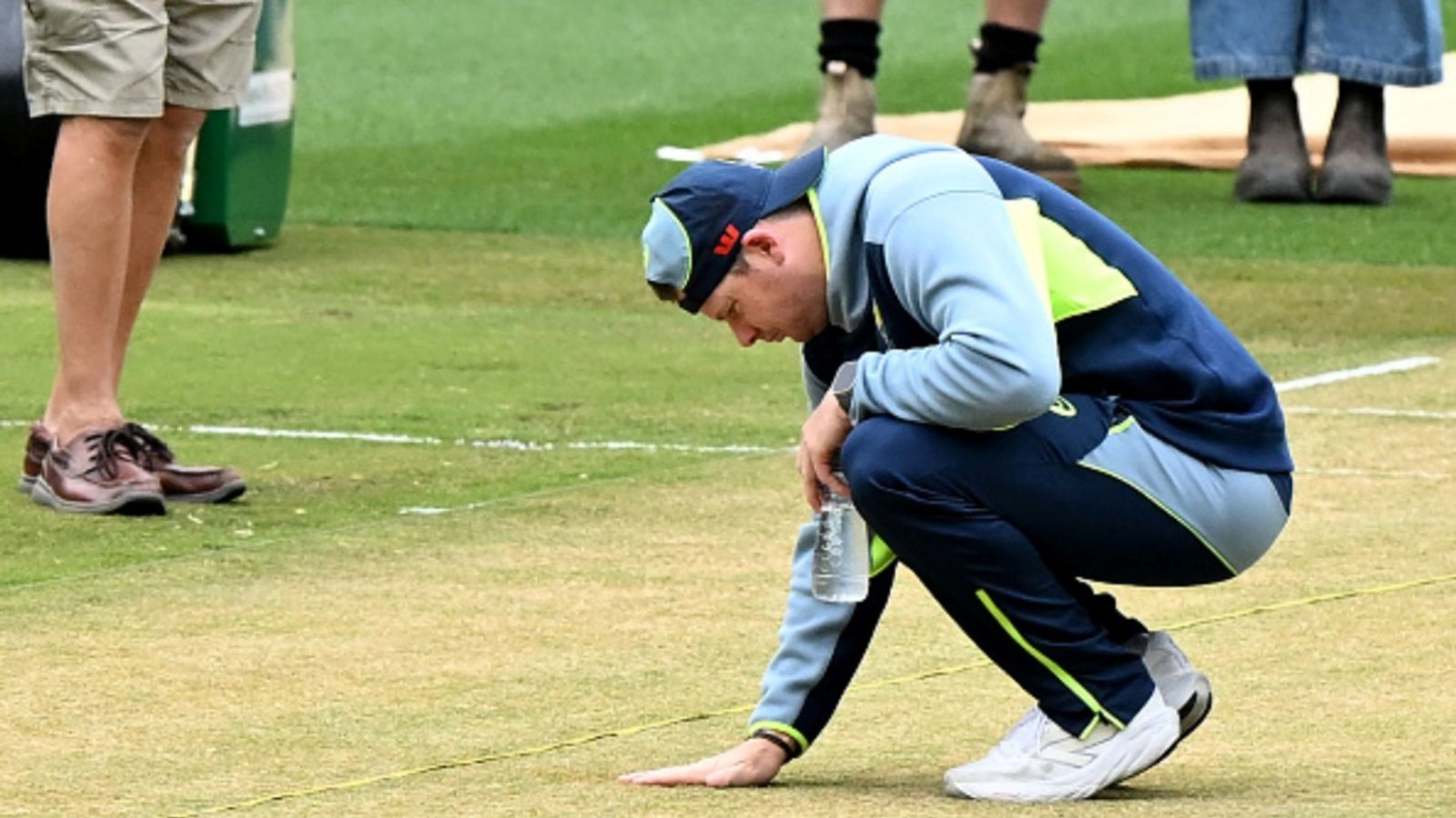 Australia announce 12-man squad for MCG Test: Inglis dropped, all-pace strategy as star pacer returns after 4 years Australia's captain Steve Smith inspects the wicket at the Melbourne Cricket Ground (MCG) on December 25, 2025.