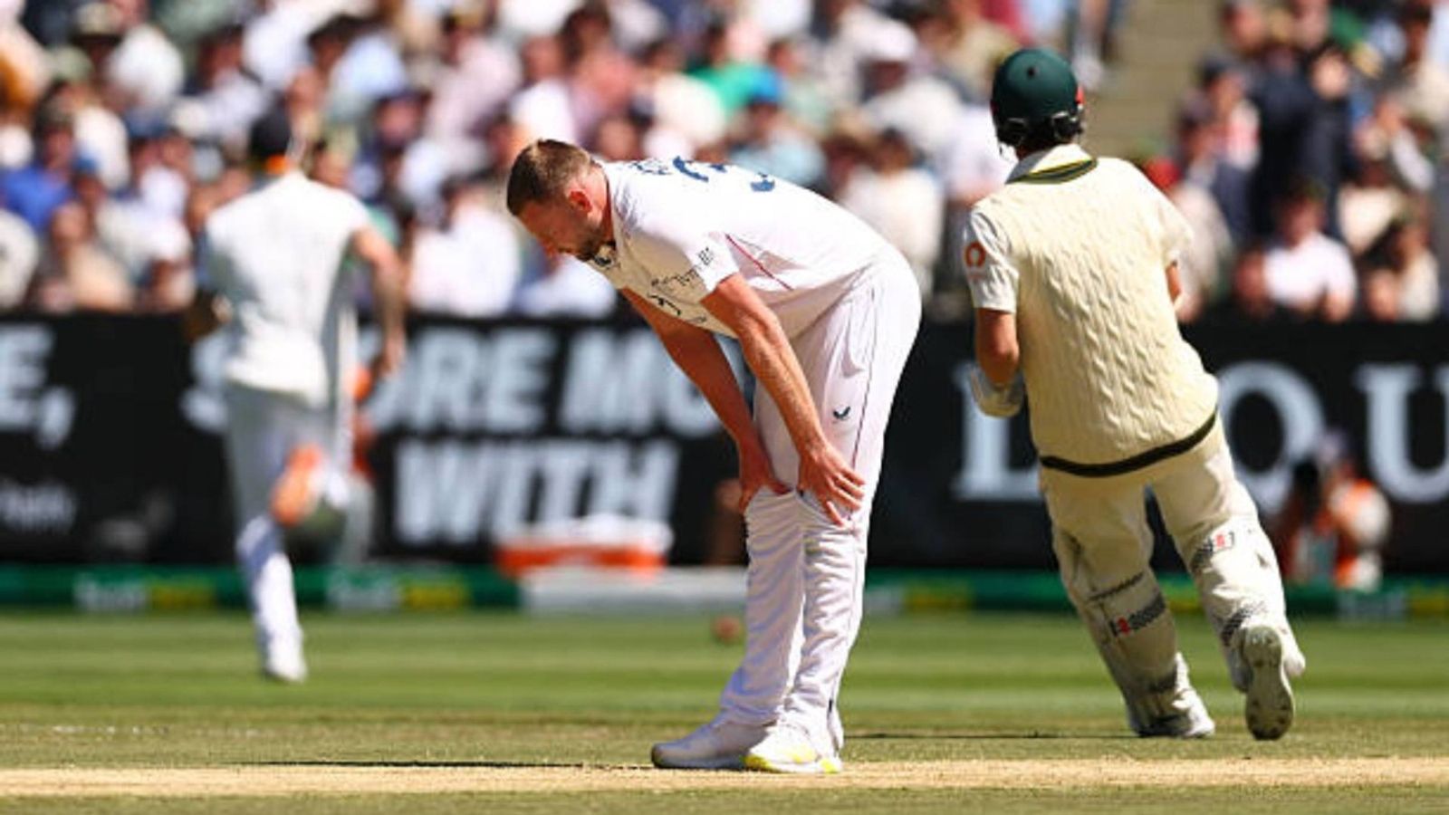 England face injury scare ahead of 5th Ashes Test as star pacer pulls hamstring in Melbourne Gus Atkinson of England gimaces after a bowling during day two of the Fourth Test in the 2025/26 Ashes Series between Australia and England at Melbourne Cricket Ground (via Getty)