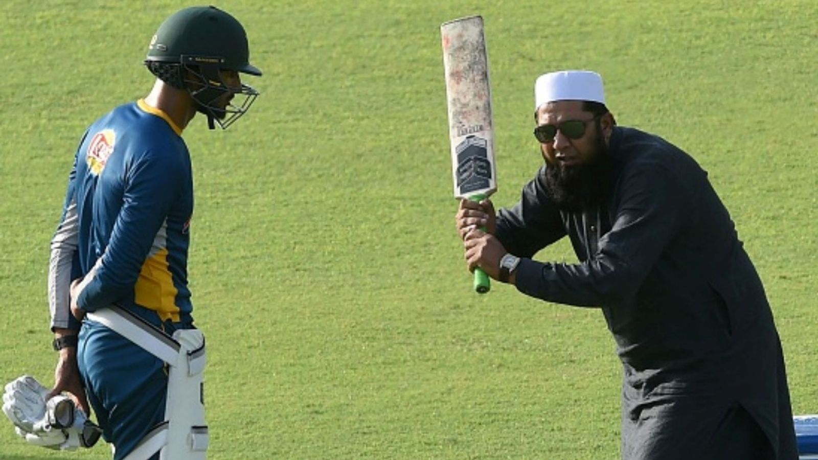 Captain Masood scores fastest 200 in first-class cricket by Pakistan batter, breaks legend's record Pakistani's Inzamam-ul-Haq (R) gives batting tips to Shan Masood during a training camp at the Gaddafi Cricket Stadium in Lahore on May 30, 2016.
