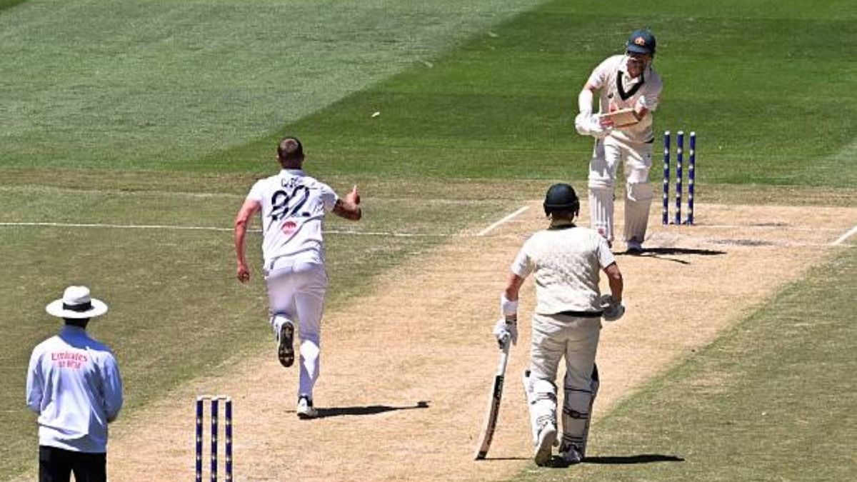 Australian batsman Travis Head (R) is bowled by England's Brydon Carse (2/L) on the second day of the fourth Ashes cricket Test match between Australia and England at the Melbourne Cricket Ground (via Getty)