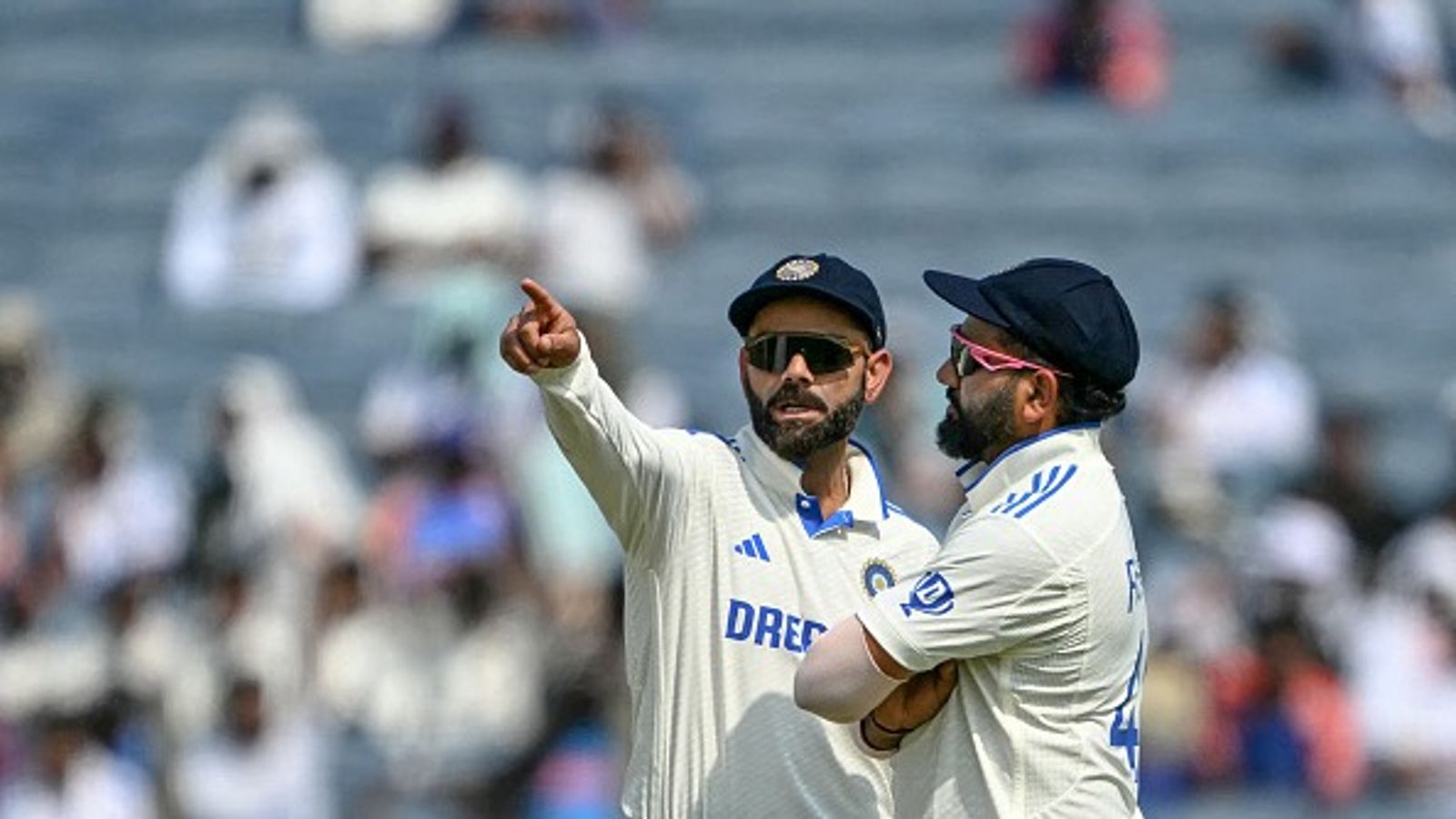 'Didn’t seem like a natural exit...': T20 World Cup winner questions Rohit Sharma, Virat Kohli's Test retirement India batting stalwarts Rohit Sharma and Virat Kohli fielding in a Test match
