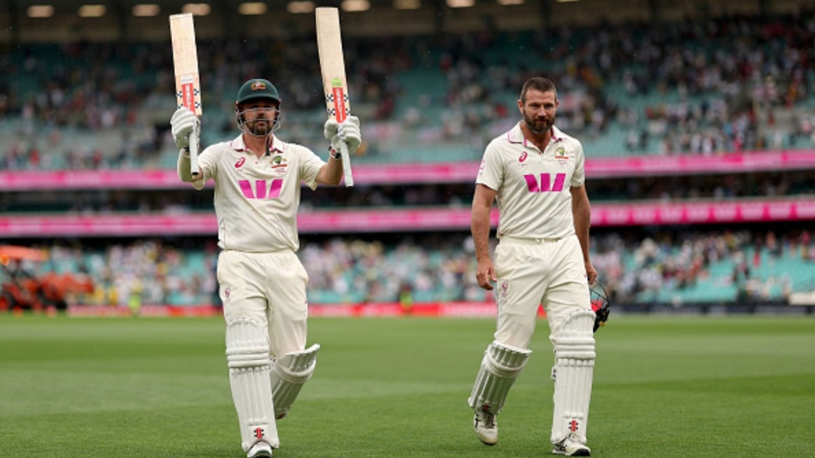 Head's unbeaten 91 steals Root's 41st ton's thunder as England lose control on Day 2 Travis Head and Michael Neser of Australia walk off the field at stumps during day two of the fifth Test in the 2025/26 Ashes at Sydney Cricket Ground on January 05, 2026 in Sydney, Australia.
