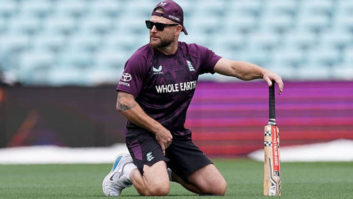 England head coach Brendan McCullum takes a knee during a nets session at the Sydney Cricket Ground (via Getty)