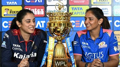 MI vs RCB Live Streaming: When and where to watch Women’s Premier League opener clash online and on TV MI vs RCB, WPL 2026: Royal Challengers Bengaluru's captain Smriti Mandhana (L) and Mumbai Indians' captain Harmanpreet Kaur look at the trophy