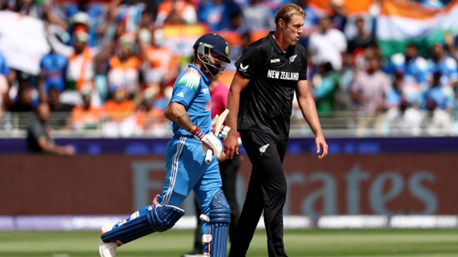'You don't contain the greats': Kyle Jamieson says he 'enjoyed watching' ex-RCB teammate Virat Kohli play Kyle Jamieson of New Zealand looks on as Virat Kohli of India runs between the wickets during the ICC Champions Trophy 2025 match at Dubai International Cricket Stadium on March 02, 2025.