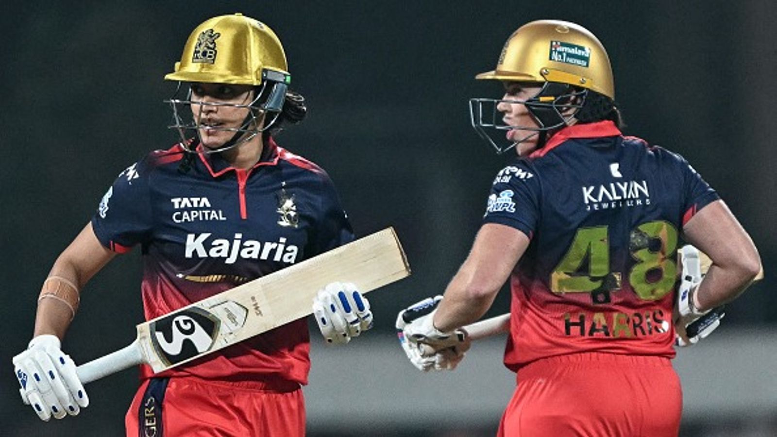 WPL 2026: Grace Harris’ 85 runs power RCB to nine-wicket win over UP Warriorz Royal Challengers Bengaluru's captain Smriti Mandhana (L) and her teammate Grace Harris run between the wickets