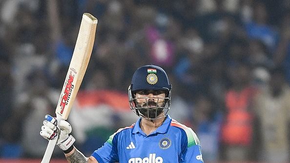 Former India captain Virat Kohli celebrating his half century