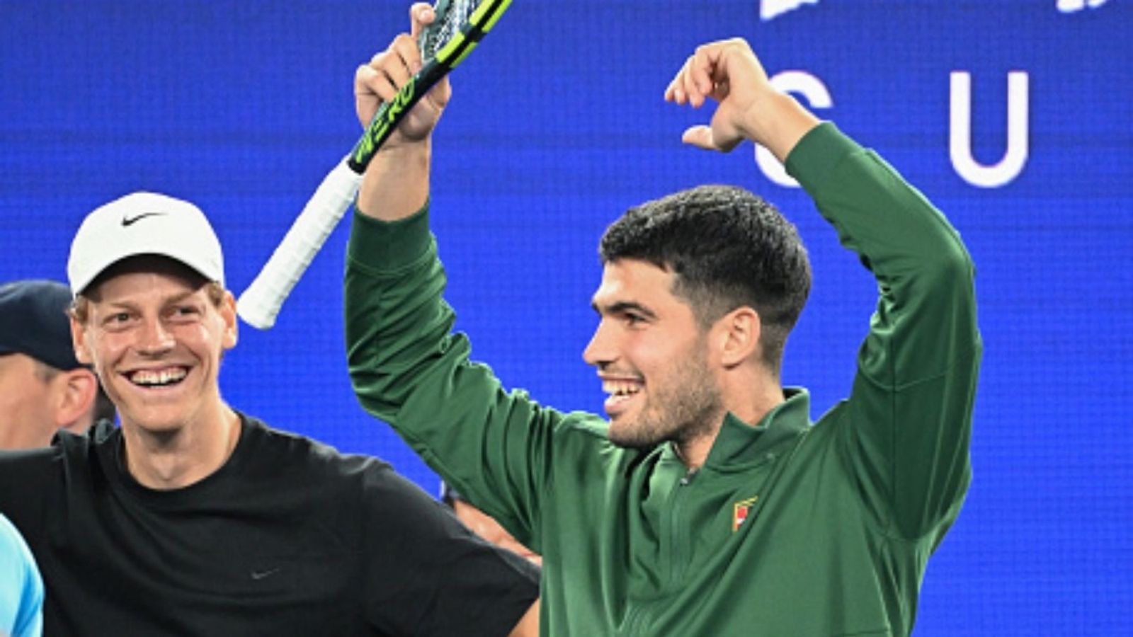 Watch: Carlos Alcaraz's hilarious reaction as announcer mistakenly calls Jannik Sinner World No. 1 at Australian Open Jannik Sinner, Carlos Alcaraz in the frame (Images via Getty)
