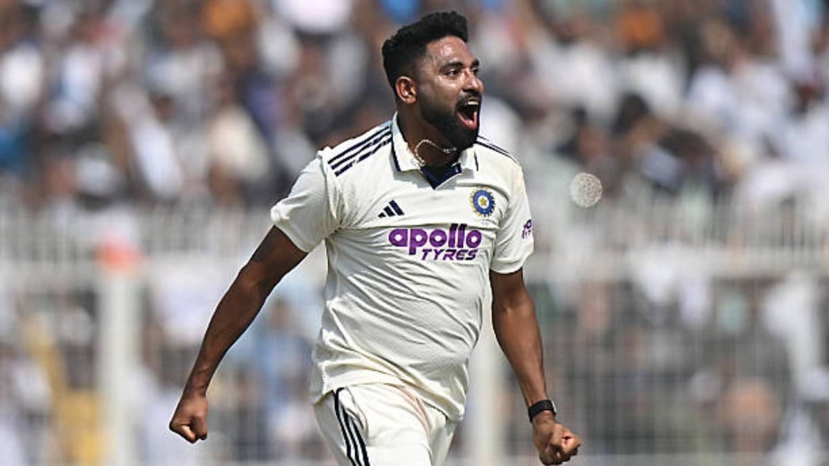 Mohammed Siraj (C) of India celebrates the wicket of Keshav Maharaj of South Africa with teammates during the First Test match in the series between India and South Africa at Eden Gardens (via Getty)