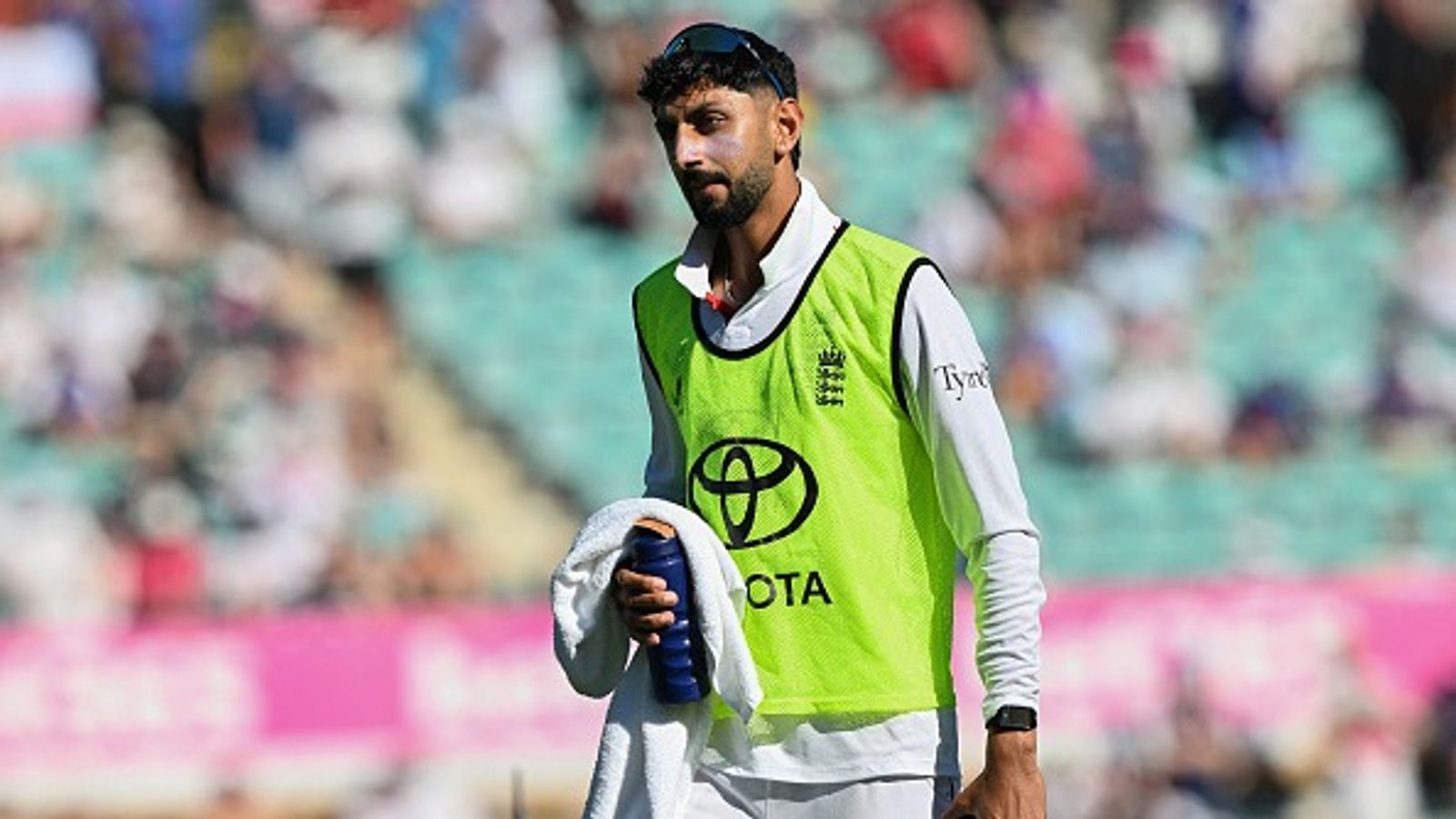 Benched for entire Ashes 2025-26, Shoaib Bashir joins new team to work with ex-Pakistan head coach England's substitute fielder Shoaib Bashir walks back from the field on day four of the fifth Ashes Test at the Sydney Cricket Ground on January 7, 2026.