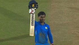 Aman Mokhade celebrating his century Aman Mokhade celebrating his century