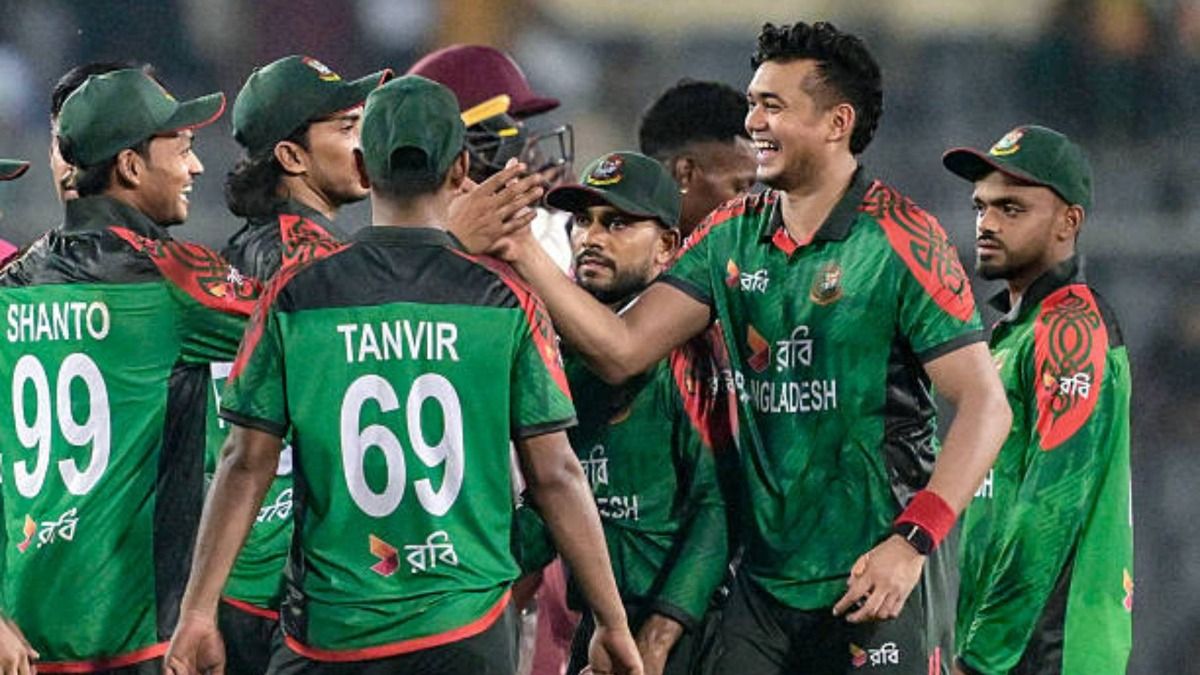 Bangladesh's players celebrate after winning the first one-day international (ODI) cricket match between Bangladesh and West Indies at the Sher-e-Bangla National Cricket Stadium (via Getty)