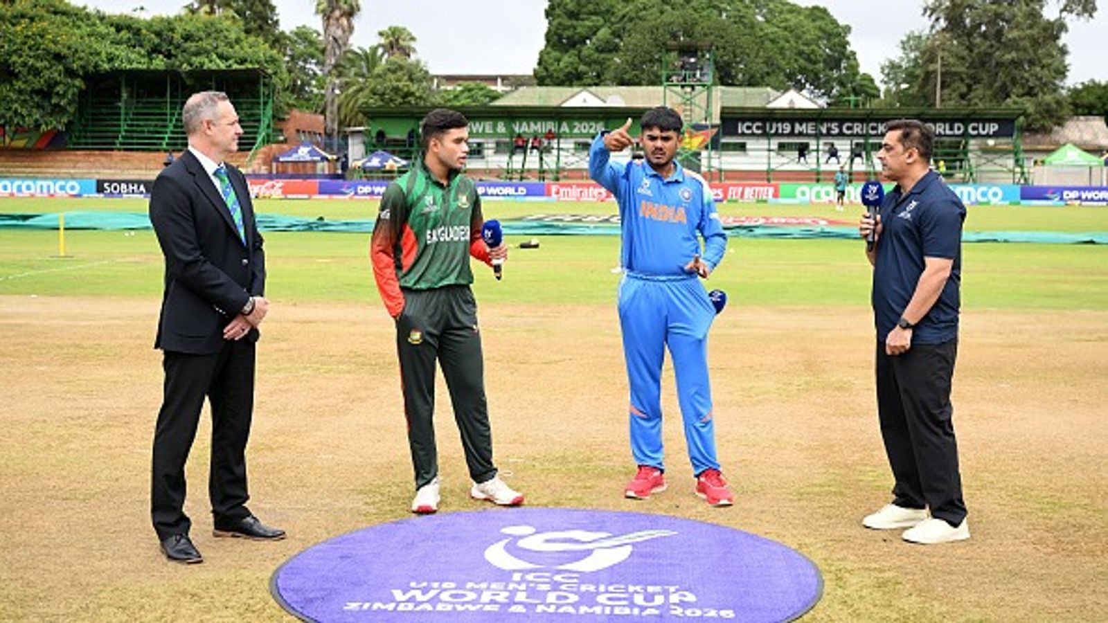 BCB gives clarification on 'no-handshake' episode during IND vs BAN U-19 World Cup clash India's Ayush Mhatre (2nd from right) flips the coin as Bangladesh's Azizul Hakim Tamim ahead of their U19 World Cup clash. (Getty)