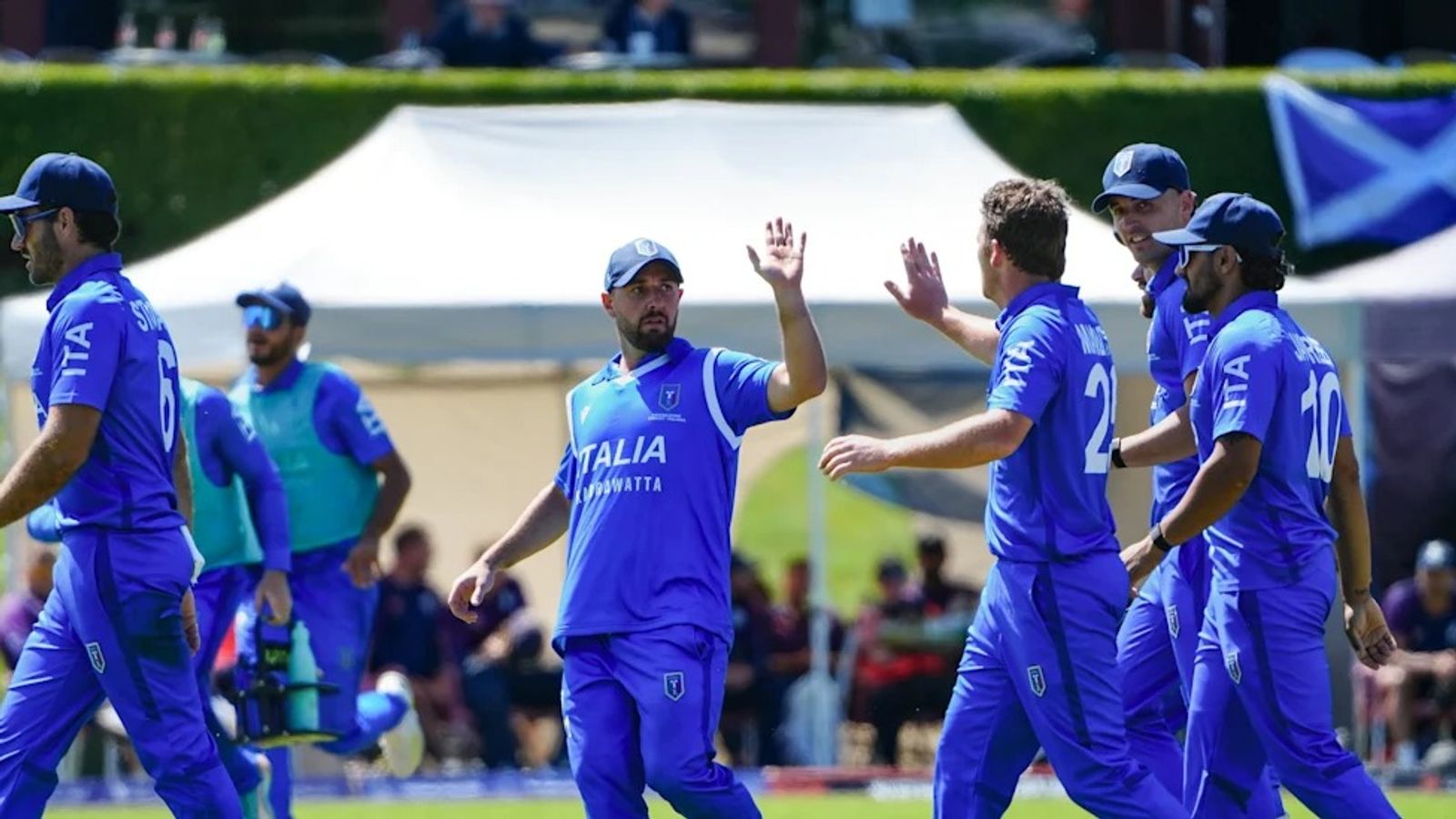 Former South Africa all-rounder included as Italy announce squad for maiden T20 World Cup appearance Italy players celebrating a win (ICC)