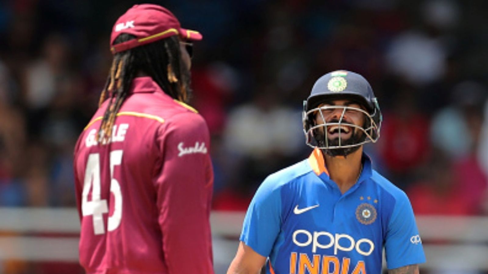 Virat Kohli breaks Chris Gayle's unwanted run chase record with 54th ODI century Chris Gayle of West Indies and Virat Kohli of India during the second ODI of the series at the Queen's Park Oval on August 11, 2019 in Port of Spain, Trinidad And Tobago.