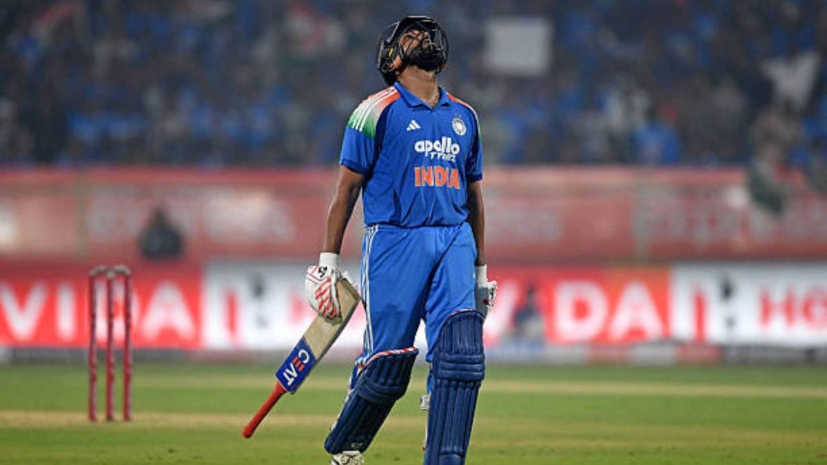 India's Rohit Sharma walks back to the pavilion after his dismissal during the third one-day international (ODI) cricket match between India and South Africa at the Y.S. Rajasekhara Reddy Cricket Stadium in Visakhapatnam (via Getty)