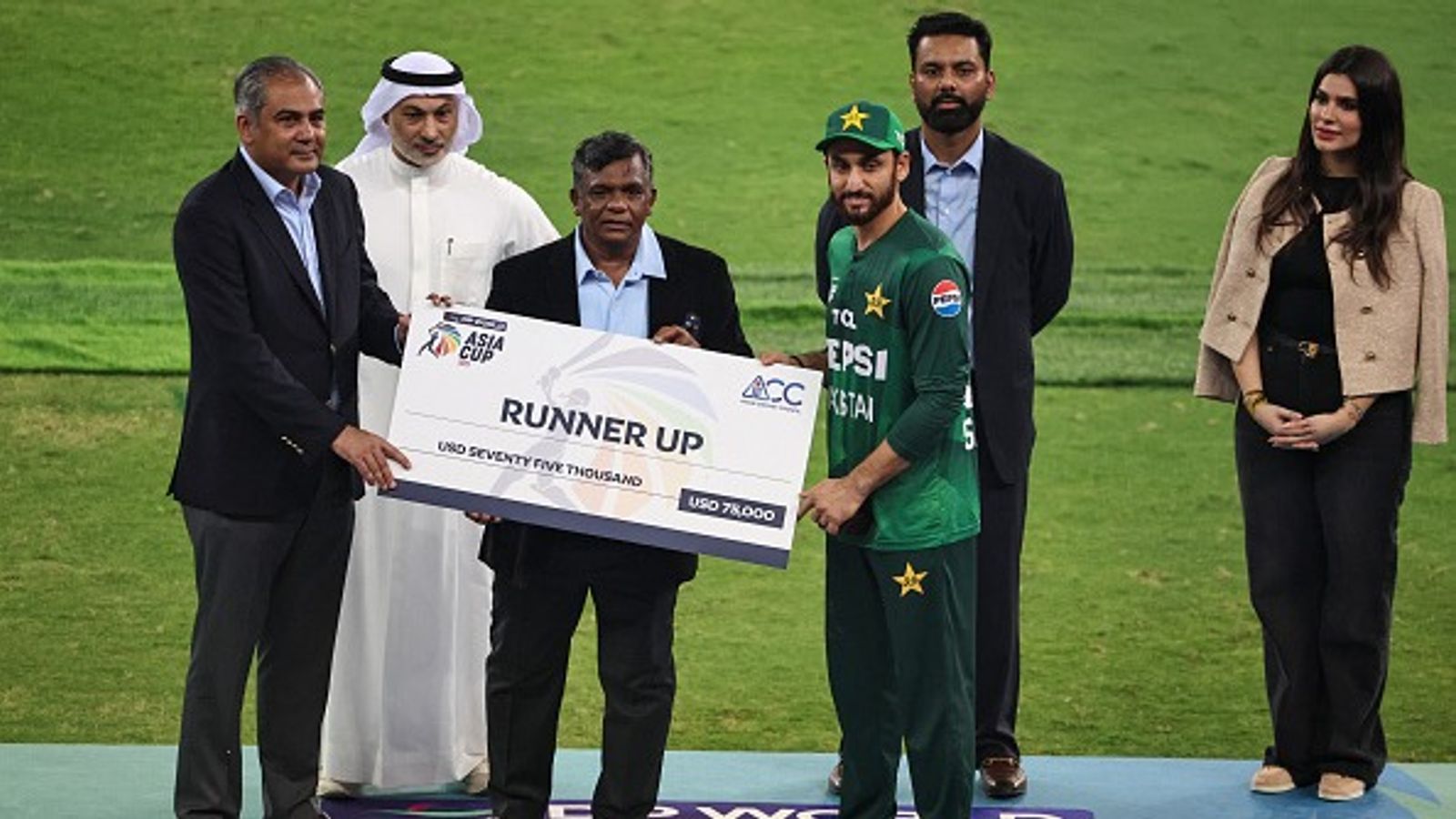 PCB writes letter to ICC backing Bangladesh's decision to not play T20 World Cup 2026 matches in India: Report Pakistan's captain Salman Agha (R) receives the runner up cheque from ACC and PCB chairman Mohsin Naqvi during the presentation ceremony at the end of the Asia Cup 2025 T20 final match between India and Pakistan in Dubai on September 28, 2025.
