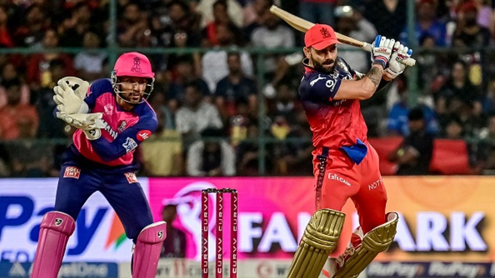 RCB and RR given deadline by IPL governing council to confirm Chinnaswamy and Sawai Mansingh stadium as home venues RCB's Virat Kohli (R) plays a shot during the IPL 2026 match against RR at the M Chinnaswamy Stadium in Bengaluru on April 24, 2025.
