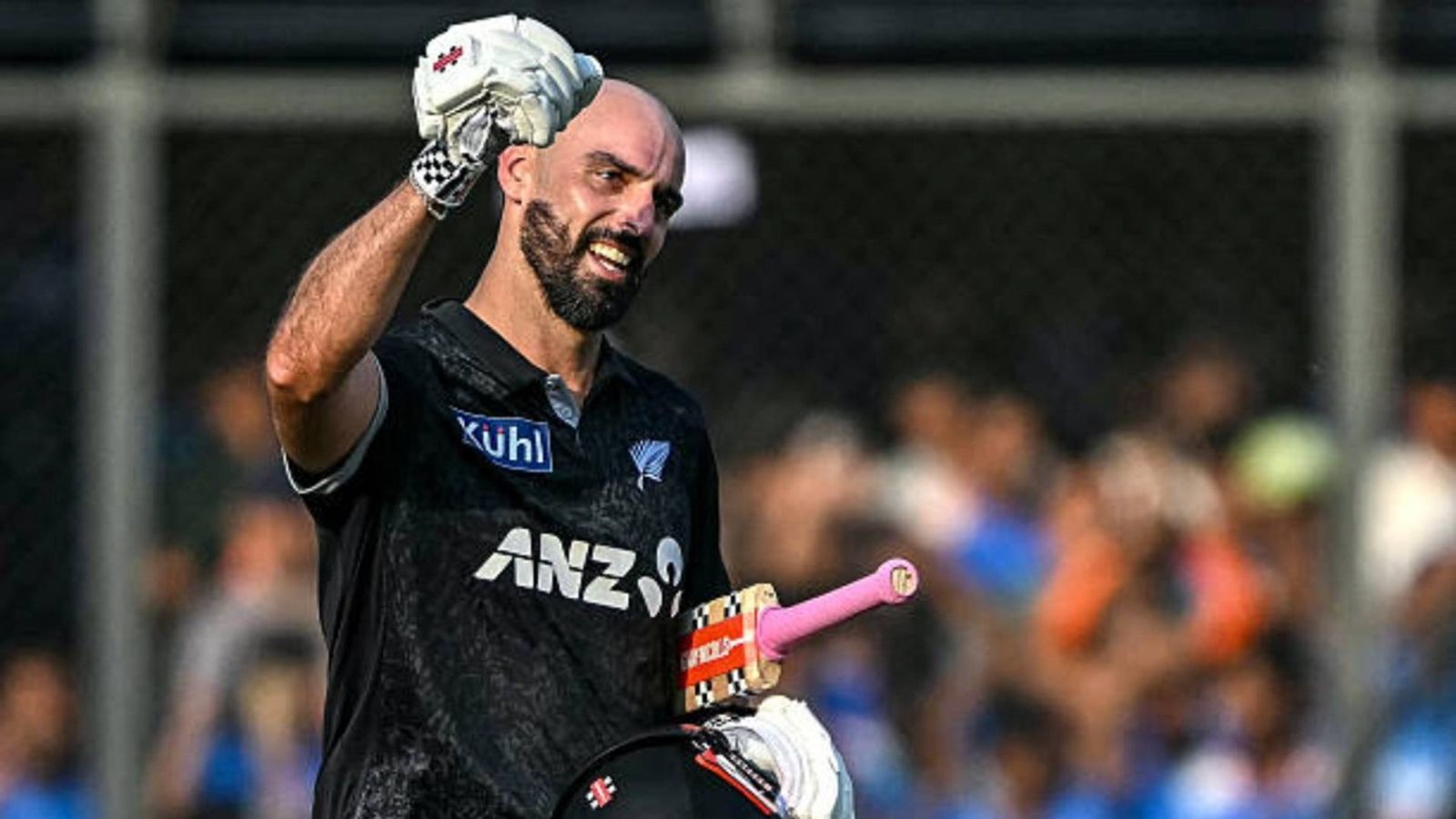 Daryl Mitchell dethrones Virat Kohli on ICC Rankings after just 7 days, Rohit Sharma loses positions too New Zealand's Daryl Mitchell celebrates after scoring a century (100 runs) during the third one-day international (ODI) cricket match between India and New Zealand at the Holkar Cricket Stadium in Indore (via Getty)