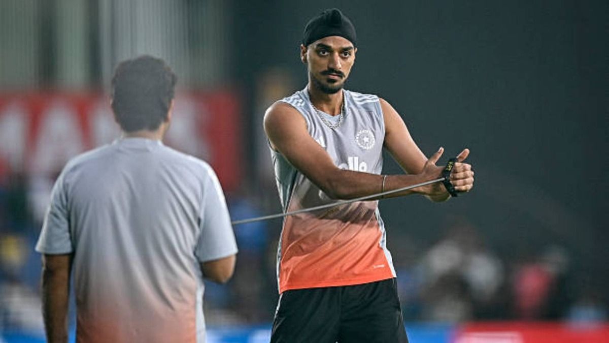 India's Arshdeep Singh warms up before the start of the first Twenty20 international cricket match between India and New Zealand at the Vidarbha Cricket Association Stadium in Nagpur (via Getty)