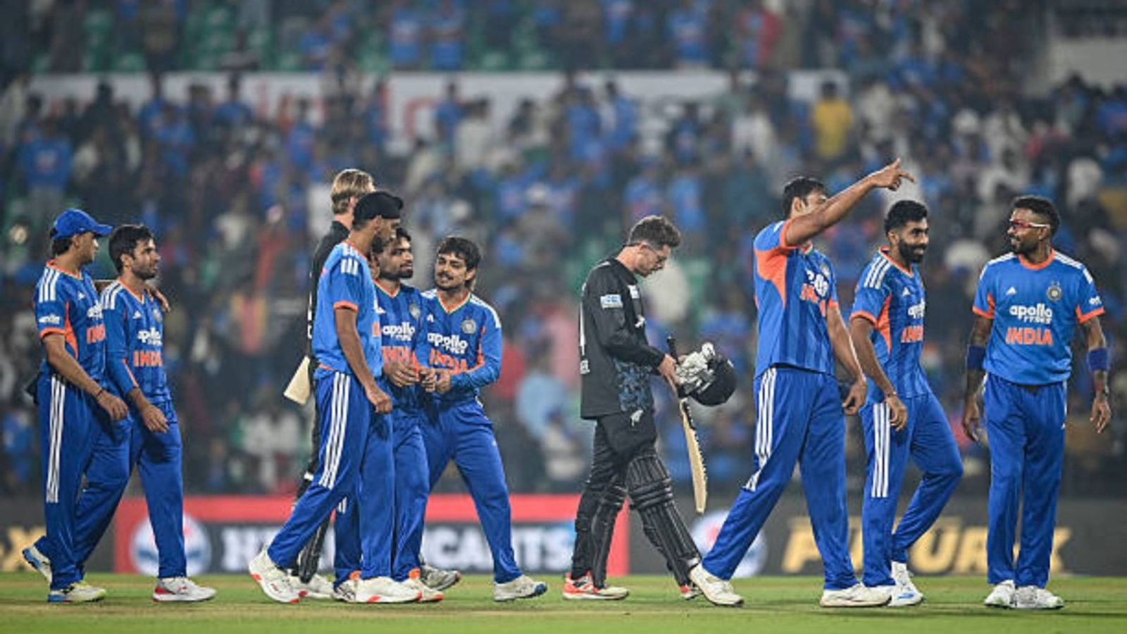 'Seems almost impossible to beat them...': Irfan Pathan hails Team India after victory over NZ in 3rd T20I India's players celebrate their team's win at the end of the first Twenty20 international cricket match between India and New Zealand at the Vidarbha Cricket Association Stadium in Nagpur (via Getty)