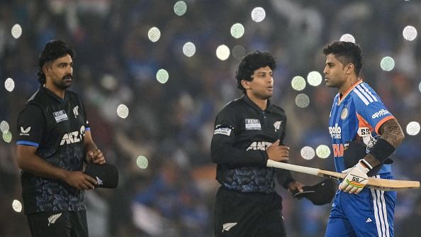 Suryakumar Yadav (R) shakes hands with New Zealand's Rachin Ravindra (C) and Ish Sodhi Suryakumar Yadav (R) shakes hands with New Zealand's Rachin Ravindra (C) and Ish Sodhi